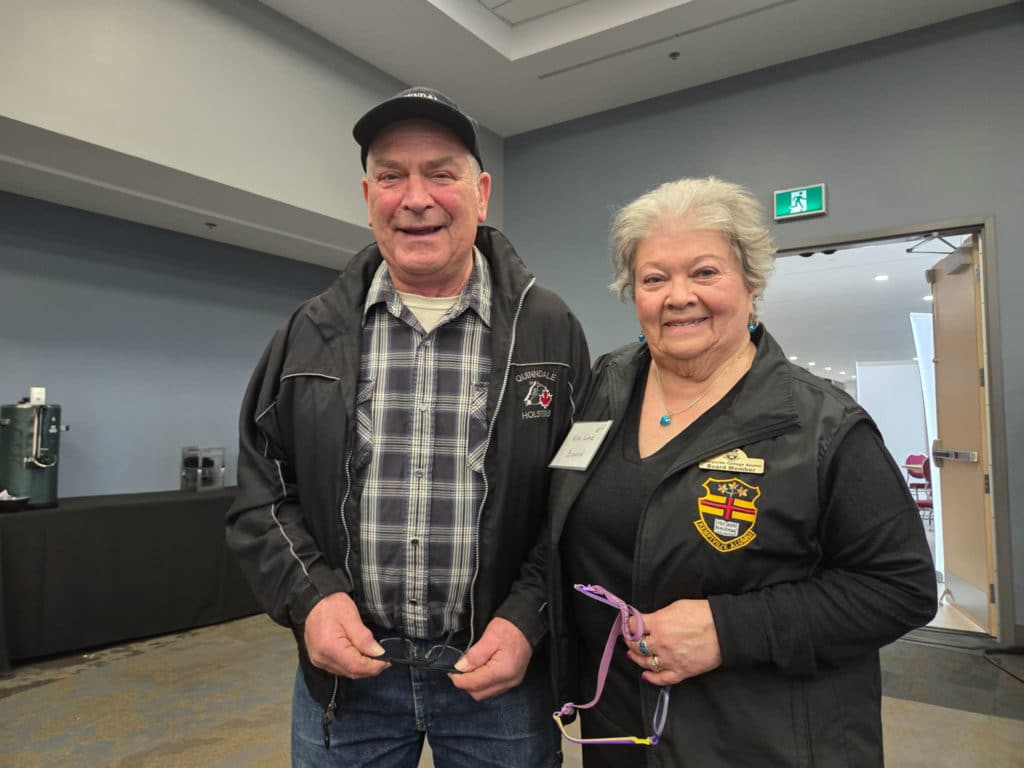 L to R Leonard Quinn, '72 Kim Link, '69